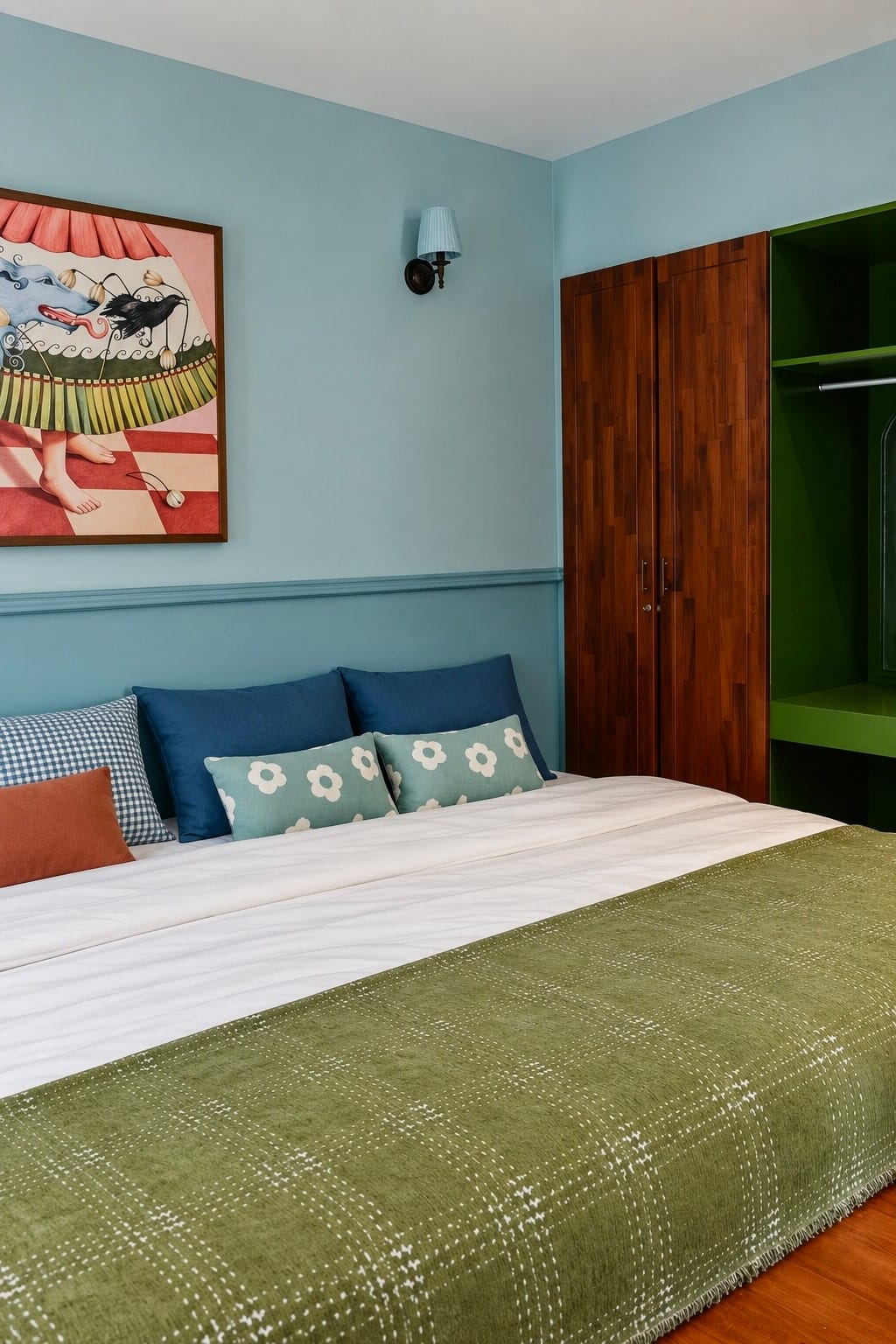 MARE bed, artwork and open green wardrobe