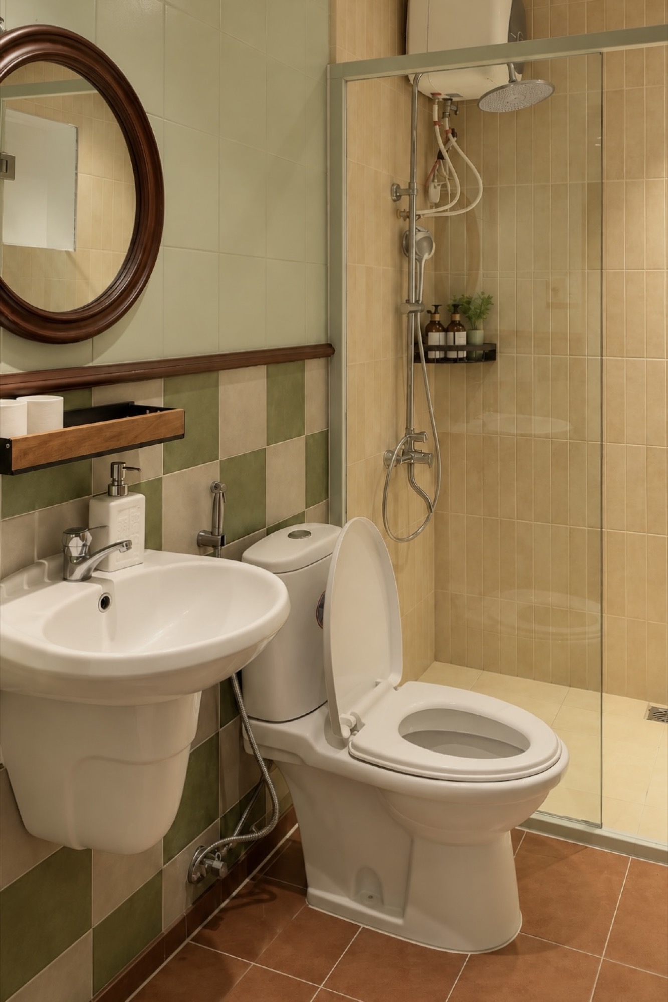 SERA's private bathroom with round mirror and green check tiles
